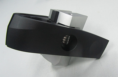 black and clear anodized Al part